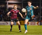 15 March 2024; Darragh Burns of Shamrock Rovers in action against Conor McCormack of Galway United during the SSE Airtricity Men's Premier Division match between Galway United and Shamrock Rovers at Eamonn Deacy Park in Galway. Photo by Piaras Ó Mídheach/Sportsfile