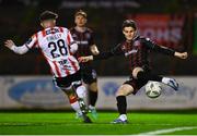 15 March 2024; Paddy Kirk of Bohemians in action against Adam O'Reilly of Derry City during the SSE Airtricity Men's Premier Division match between Bohemians and Derry City at Dalymount Park in Dublin. Photo by Tyler Miller/Sportsfile