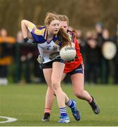 15 March 2024; Kate Brennan of Ballinrobe Community School in action against Szonja Mora of St Marys during the Lidl All-Ireland Post Primary School Junior C Championship final match between St Marys, Macroom, Cork and Ballinrobe Community School, Mayo at the University of Limerick. Photo by Matt Browne/Sportsfile