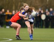 15 March 2024; Kate Brennan of Ballinrobe Community School in action against Szonja Mora of St Marys during the Lidl All-Ireland Post Primary School Junior C Championship final match between St Marys, Macroom, Cork and Ballinrobe Community School, Mayo at the University of Limerick. Photo by Matt Browne/Sportsfile