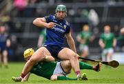 16 March 2024; Fintan Burke of Galway in action against Seamus Flanagan of Limerick during the Allianz Hurling League Division 1 Group B match between Galway and Limerick at Pearse Stadium in Galway. Photo by Stephen McCarthy/Sportsfile