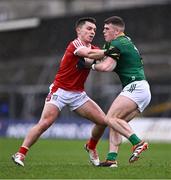 16 March 2024; Eoghan Frayne of Meath is held up by Sean Powter of Cork during the Allianz Football League Division 2 match between Meath and Cork at Páirc Tailteann in Navan, Meath. Photo by Ben McShane/Sportsfile