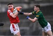 16 March 2024; Chris Og Jones of Cork in action against Cathal Hickey of Meath during the Allianz Football League Division 2 match between Meath and Cork at Páirc Tailteann in Navan, Meath. Photo by Ben McShane/Sportsfile