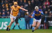 16 March 2024; Sean Ryan of Tipperary in action against Phelim Duffin of Antrim during the Allianz Hurling League Division 1 Group B match between Antrim and Tipperary at Corrigan Park in Belfast. Photo by Ramsey Cardy/Sportsfile