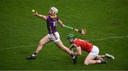 16 March 2024; Darragh Carley of Wexford wins possession ahead of Seamus Harnedy of Cork during the Allianz Hurling League Division 1 Group A match between Wexford and Cork at Chadwicks Wexford Park in Wexford. Photo by Ray McManus/Sportsfile