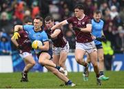 16 March 2024; Tom Lahiff of Dublin in action against John Daly and Cillian Ó Curraoin, right, of Galway during the Allianz Football League Division 1 match between Galway and Dublin at Pearse Stadium in Galway. Photo by Stephen McCarthy/Sportsfile