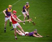 16 March 2024; Wexford players Simon Donohoe, left, Eoin Ryan and Conor Foley look on as Alan Connolly of Cork scores his side's second goal, in the 26th minute, during the Allianz Hurling League Division 1 Group A match between Wexford and Cork at Chadwicks Wexford Park in Wexford. Photo by Ray McManus/Sportsfile