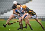 16 March 2024; Peter Hogan of Waterford in action against Kilkenny players Mikey Carey, left, and Shane Murphy during the Allianz Hurling League Division 1 Group A match between Waterford and Kilkenny at Walsh Park in Waterford. Photo by Seb Daly/Sportsfile