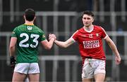 16 March 2024; Chris Og Jones of Cork, right, and Keith Curtis of Meath after the Allianz Football League Division 2 match between Meath and Cork at Páirc Tailteann in Navan, Meath. Photo by Ben McShane/Sportsfile