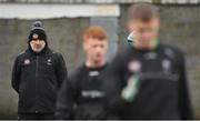 16 March 2024; Kildare manager Glenn Ryan watches his players in the warm up before the Allianz Football League Division 2 match between Kildare and Donegal at Netwatch Cullen Park in Carlow. Photo by Matt Browne/Sportsfile