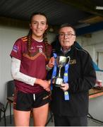 16 March 2024; Evie McCafferty of St Ronan's College receives the cup from LGFA representative Gerry Doherty after the 2024 Lidl All-Ireland Junior Post-Primary Schools Junior B Final. Photo by Stephen Marken/Sportsfile