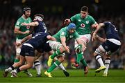 16 March 2024; Tadhg Beirne of Ireland knocks on as he is tackled by George Turner of Scotland during the Guinness Six Nations Rugby Championship match between Ireland and Scotland at the Aviva Stadium in Dublin. Photo by Harry Murphy/Sportsfile