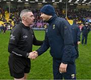 16 March 2024; Referee Liam Gordon shakes hands with Wexford manager Keith Rossiter after the Allianz Hurling League Division 1 Group A match between Wexford and Cork at Chadwicks Wexford Park in Wexford. Photo by Ray McManus/Sportsfile