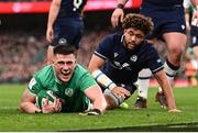 16 March 2024; Dan Sheehan of Ireland celebrates after scoring his side's first try during the Guinness Six Nations Rugby Championship match between Ireland and Scotland at the Aviva Stadium in Dublin. Photo by Harry Murphy/Sportsfile