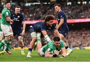 16 March 2024; Dan Sheehan of Ireland dives over to score his side's first try despite the efforts of Andy Christie of Scotland during the Guinness Six Nations Rugby Championship match between Ireland and Scotland at the Aviva Stadium in Dublin. Photo by Harry Murphy/Sportsfile