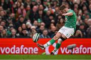 16 March 2024; Jack Crowley of Ireland kicks a conversion during the Guinness Six Nations Rugby Championship match between Ireland and Scotland at the Aviva Stadium in Dublin. Photo by Brendan Moran/Sportsfile