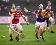16 March 2024; Sean O'Donoghue of Cork in action against Liam Óg McGovern of Wexford during the Allianz Hurling League Division 1 Group A match between Wexford and Cork at Chadwicks Wexford Park in Wexford. Photo by Ray McManus/Sportsfile