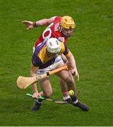 16 March 2024; Darragh Carley of Wexford is tackled by Declan Dalton of Cork during the Allianz Hurling League Division 1 Group A match between Wexford and Cork at Chadwicks Wexford Park in Wexford. Photo by Ray McManus/Sportsfile