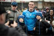 16 March 2024; Brian Fenton of Dublin poses for a photograph with supporters after the Allianz Football League Division 1 match between Galway and Dublin at Pearse Stadium in Galway. Photo by Stephen McCarthy/Sportsfile