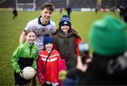 16 March 2024; Evan Comerford of Dublin poses for a photograph with supporters after the Allianz Football League Division 1 match between Galway and Dublin at Pearse Stadium in Galway. Photo by Stephen McCarthy/Sportsfile