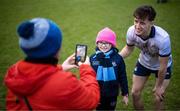 16 March 2024; Holly Kelly-O'Toole has a photograph taken with Evan Comerford of Dublin by Helena Kelly after the Allianz Football League Division 1 match between Galway and Dublin at Pearse Stadium in Galway. Photo by Stephen McCarthy/Sportsfile