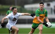 16 March 2024; Michael Langan of Donegal in action against Eoin Doyle of Kildare during the Allianz Football League Division 2 match between Kildare and Donegal at Netwatch Cullen Park in Carlow. Photo by Matt Browne/Sportsfile