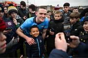 16 March 2024; Brian Fenton of Dublin takes a photography with a supporter after the Allianz Football League Division 1 match between Galway and Dublin at Pearse Stadium in Galway. Photo by Stephen McCarthy/Sportsfile