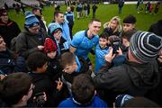 16 March 2024; Brian Fenton of Dublin takes a photography with a supporter after the Allianz Football League Division 1 match between Galway and Dublin at Pearse Stadium in Galway. Photo by Stephen McCarthy/Sportsfile