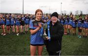 16 March 2024; Katie O’Meara of Loreto College Cavan receives the cup from Gearldine Carey representing the LGFA following the 2024 Lidl All-Ireland Junior Post-Primary Schools Junior A Championship final between FCJ Secondary School, Bunclody, Wexford and Loreto College, Cavan, at the GAA National Games Development Centre, Abbotstown in Dublin. Photo by Michael P Ryan/Sportsfile