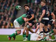 16 March 2024; Andy Christie of Scotland is tackled by Joe McCarthy of Ireland during the Guinness Six Nations Rugby Championship match between Ireland and Scotland at the Aviva Stadium in Dublin. Photo by Brendan Moran/Sportsfile