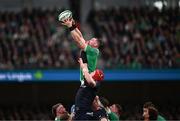 16 March 2024; Peter O’Mahony of Ireland wins possession in a line-out ahead of Grant Gilchrist of Scotland during the Guinness Six Nations Rugby Championship match between Ireland and Scotland at the Aviva Stadium in Dublin. Photo by Harry Murphy/Sportsfile