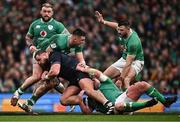 16 March 2024; Pierre Schoeman of Scotland is tackled by Dan Sheehan, left, and Tadhg Furlong of Ireland during the Guinness Six Nations Rugby Championship match between Ireland and Scotland at the Aviva Stadium in Dublin. Photo by Harry Murphy/Sportsfile