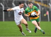16 March 2024; Shane O'Donnell of Donegal in action against Ryan Houlihan of Kildare during the Allianz Football League Division 2 match between Kildare and Donegal at Netwatch Cullen Park in Carlow. Photo by Matt Browne/Sportsfile