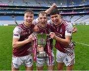 16 March 2024; Omagh CBS players, from left, Jack Law, Blaine Lynch and Mark Corcoran celebrate after their side's victory in the Masita GAA Football Post Primary Schools Hogan Cup final match between Mercy Mounthawk of Kerry and Omagh CBS of Tyrone at Croke Park in Dublin. Photo by Piaras Ó Mídheach/Sportsfile