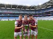 16 March 2024; Omagh CBS players, from left, Jack Law, Blaine Lynch and Mark Corcoran celebrate after their side's victory in the Masita GAA Football Post Primary Schools Hogan Cup final match between Mercy Mounthawk of Kerry and Omagh CBS of Tyrone at Croke Park in Dublin. Photo by Piaras Ó Mídheach/Sportsfile