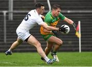 16 March 2024; Peadar Morgan of Donegal in action against Eoin Doyle of Kildare during the Allianz Football League Division 2 match between Kildare and Donegal at Netwatch Cullen Park in Carlow. Photo by Matt Browne/Sportsfile