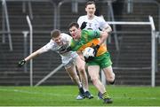 16 March 2024; Mark Curran of Donegal in action against Barry Kelly of Kildare during the Allianz Football League Division 2 match between Kildare and Donegal at Netwatch Cullen Park in Carlow. Photo by Matt Browne/Sportsfile