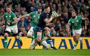 16 March 2024; Jack Dempsey of Scotland is tackled by Tadhg Beirne of Ireland during the Guinness Six Nations Rugby Championship match between Ireland and Scotland at the Aviva Stadium in Dublin. Photo by Brendan Moran/Sportsfile