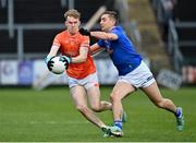 16 March 2024; Conor Turbitt of Armagh in action against Killian Clarke of Cavan during the Allianz Football League Division 2 match between Armagh and Cavan at BOX-IT Athletic Grounds in Armagh. Photo by Oliver McVeigh/Sportsfile
