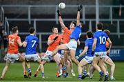 16 March 2024; Ben Crealey of Armagh in action against Killian Clarke of Cavan during the Allianz Football League Division 2 match between Armagh and Cavan at BOX-IT Athletic Grounds in Armagh. Photo by Oliver McVeigh/Sportsfile