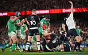 16 March 2024; Andrew Porter of Ireland, hidden, dives over to score his side's second try during the Guinness Six Nations Rugby Championship match between Ireland and Scotland at the Aviva Stadium in Dublin. Photo by Sam Barnes/Sportsfile