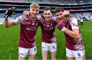 16 March 2024; Omagh CBS players, from left, John Edgar, Paudi Dillon and Mark Corcoran celebrate after their side's victory in the Masita GAA Football Post Primary Schools Hogan Cup final match between Mercy Mounthawk of Kerry and Omagh CBS of Tyrone at Croke Park in Dublin. Photo by Piaras Ó Mídheach/Sportsfile