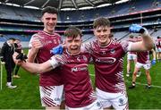16 March 2024; Omagh CBS players, from left, Niall McCarney, Nathan Farry and Ruairí McCullagh celebrate after their side's victory in the Masita GAA Football Post Primary Schools Hogan Cup final match between Mercy Mounthawk of Kerry and Omagh CBS of Tyrone at Croke Park in Dublin. Photo by Piaras Ó Mídheach/Sportsfile