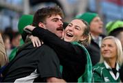 16 March 2024; Ireland supporters embrace after Andrew Porter of Ireland scores their side's second try during the Guinness Six Nations Rugby Championship match between Ireland and Scotland at the Aviva Stadium in Dublin. Photo by Brendan Moran/Sportsfile