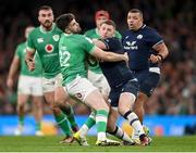16 March 2024; Finn Russell of Scotland in action against Harry Byrne of Ireland during the Guinness Six Nations Rugby Championship match between Ireland and Scotland at the Aviva Stadium in Dublin. Photo by Sam Barnes/Sportsfile