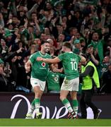 16 March 2024; Conor Murray, left, and Jack Crowley celebrate after the final whistle in the Guinness Six Nations Rugby Championship match between Ireland and Scotland at the Aviva Stadium in Dublin. Photo by Brendan Moran/Sportsfile