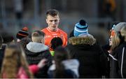 16 March 2024; Rian O'Neill  of Armagh surrounded by autograph hunters after the Allianz Football League Division 2 match between Armagh and Cavan at BOX-IT Athletic Grounds in Armagh. Photo by Oliver McVeigh/Sportsfile