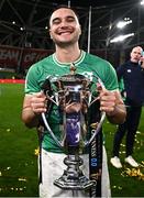 16 March 2024; James Lowe of Ireland celebrates with the Six Nations trophy after the Guinness Six Nations Rugby Championship match between Ireland and Scotland at the Aviva Stadium in Dublin. Photo by Harry Murphy/Sportsfile