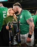 16 March 2024; Andrew Porter of Ireland and his partner Elaine Sutton celebrate with the Six Nations trophy after the Guinness Six Nations Rugby Championship match between Ireland and Scotland at the Aviva Stadium in Dublin. Photo by Harry Murphy/Sportsfile