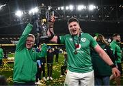 16 March 2024; Joe McCarthy of Ireland and his brother Andrew celebrate with the Six Nations trophy after the Guinness Six Nations Rugby Championship match between Ireland and Scotland at the Aviva Stadium in Dublin. Photo by Harry Murphy/Sportsfile